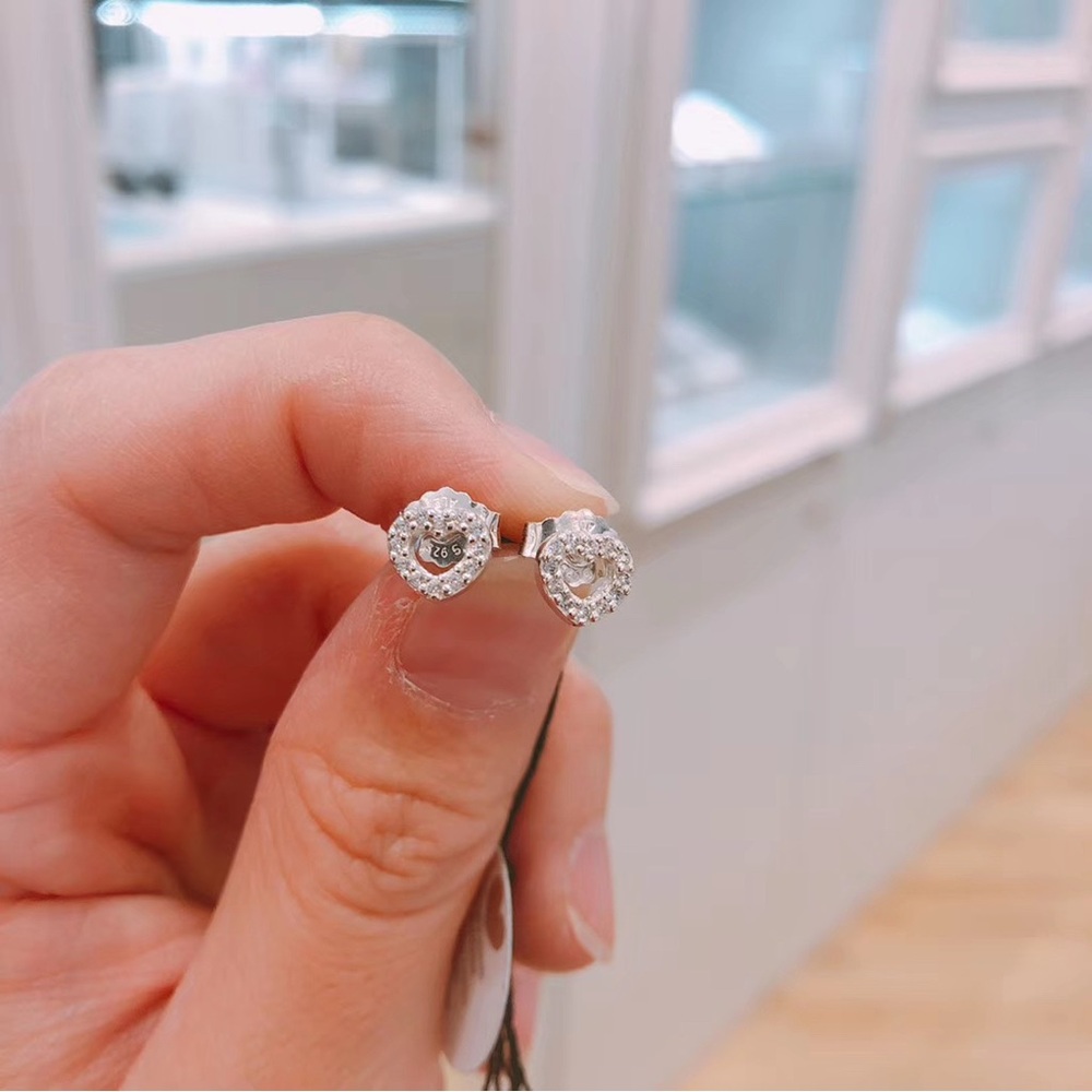 Authentic Pandora Sparkling Elevating Heart Stud Earrings